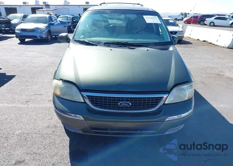 2003 Ford Windstar Limited из США, поврежденный, VIN 2FMDA584X3BA03540